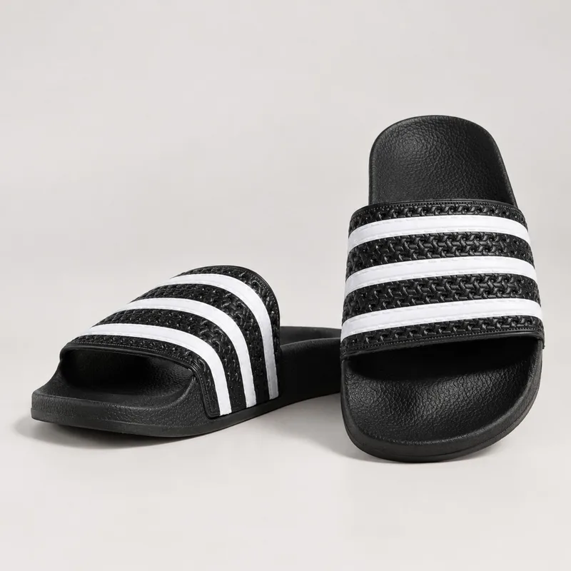 CLAQUETTES  HOMME